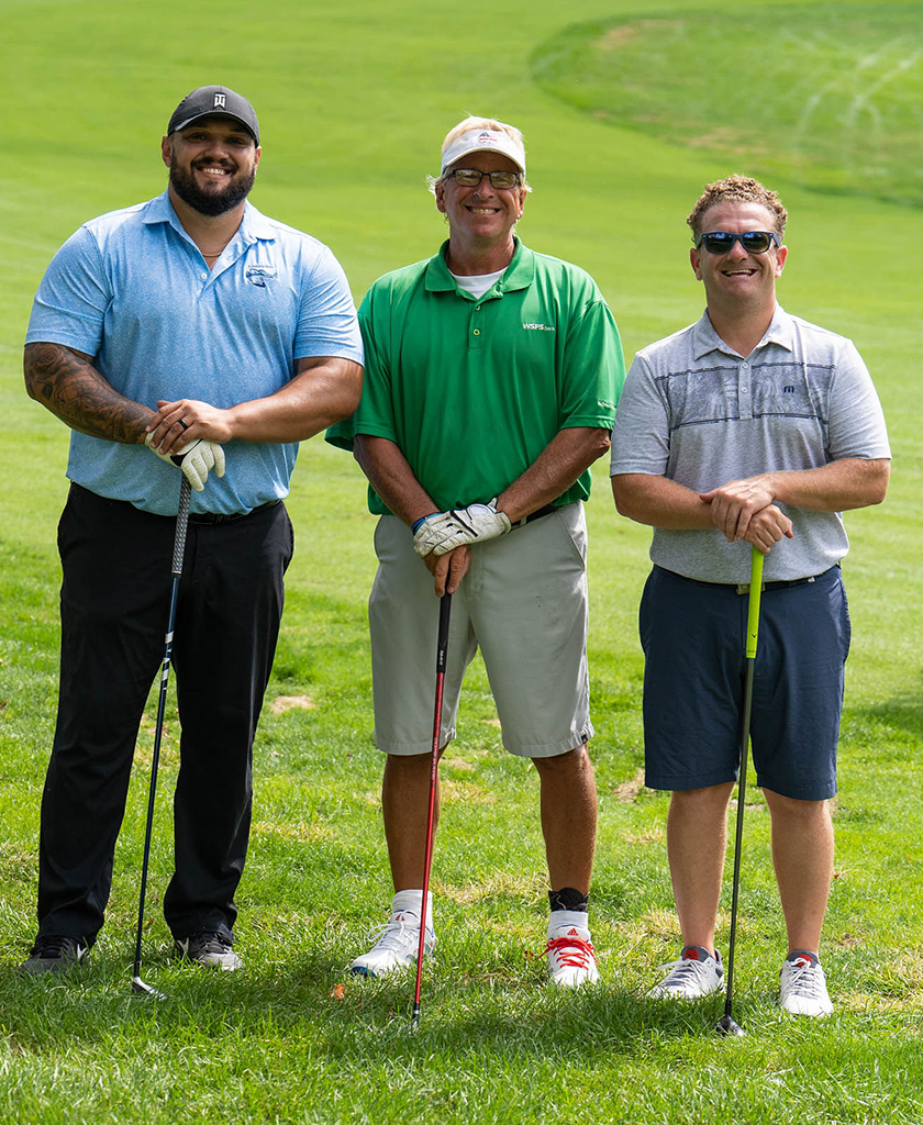 Niko Labrador, Golf Classic Committee Chair Charlie Kueny, and Nick Taglianetti.