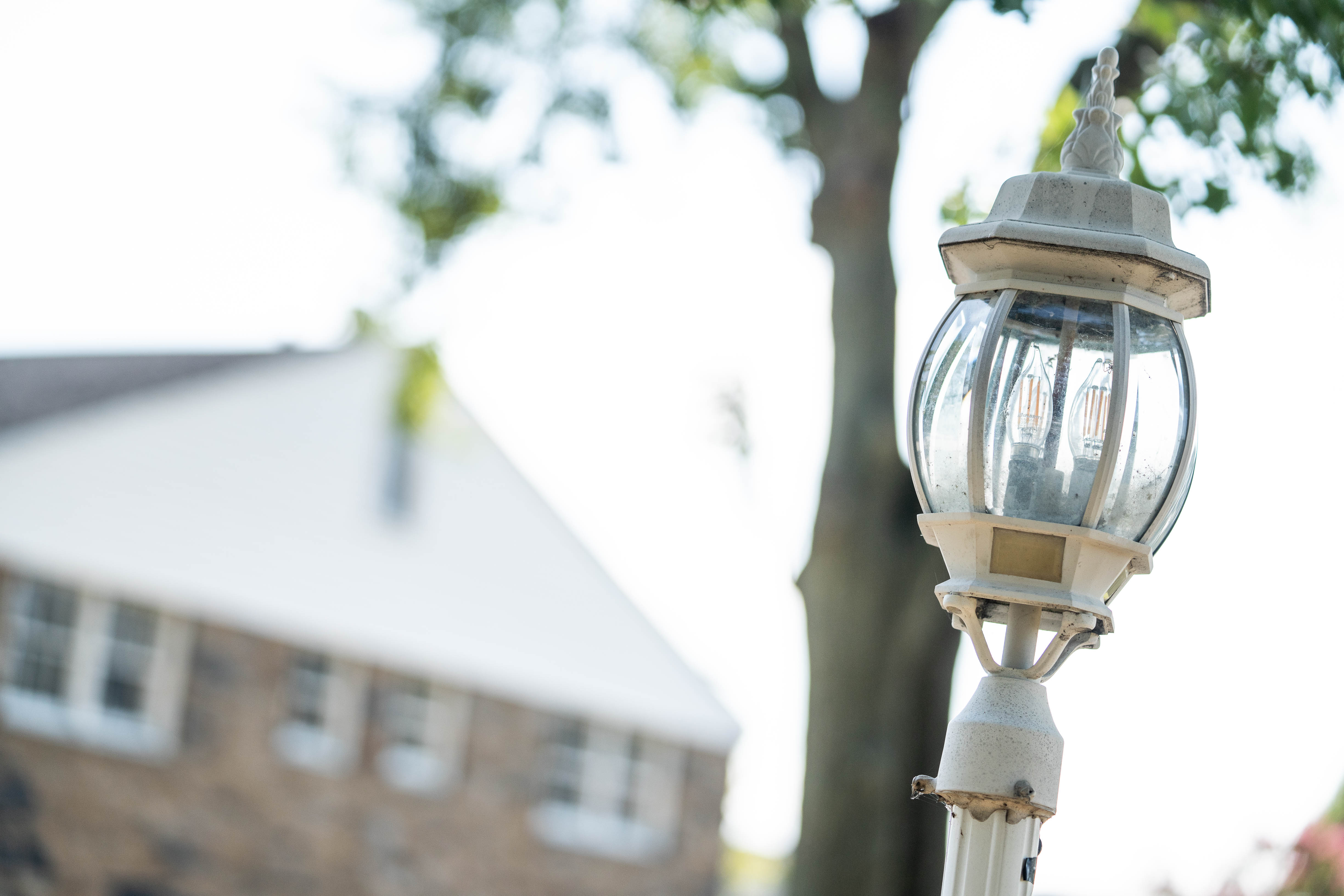 Lamp post and campus building