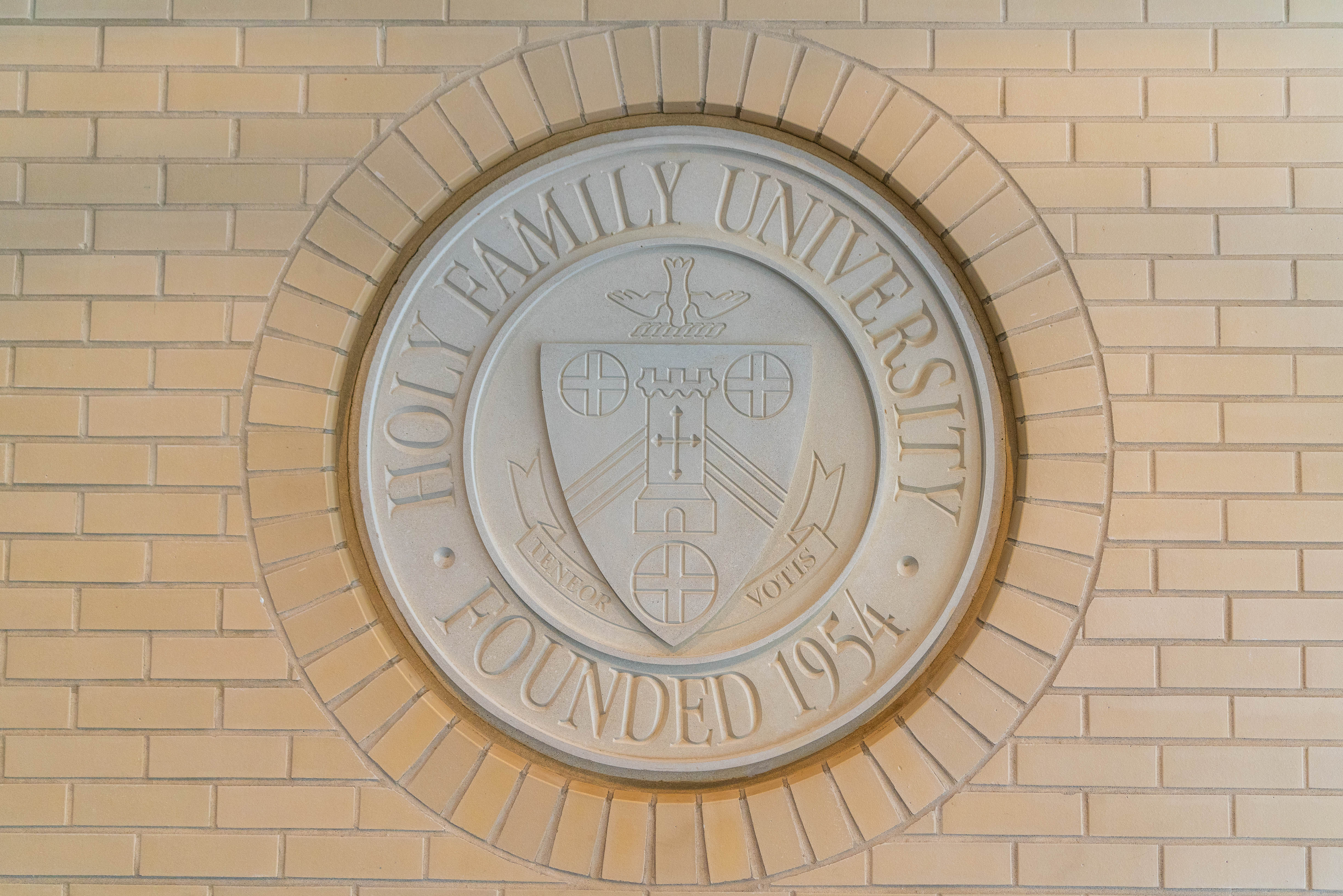 HFU Environmental-96-September 16, 2020.jpg University Seal on brick wall