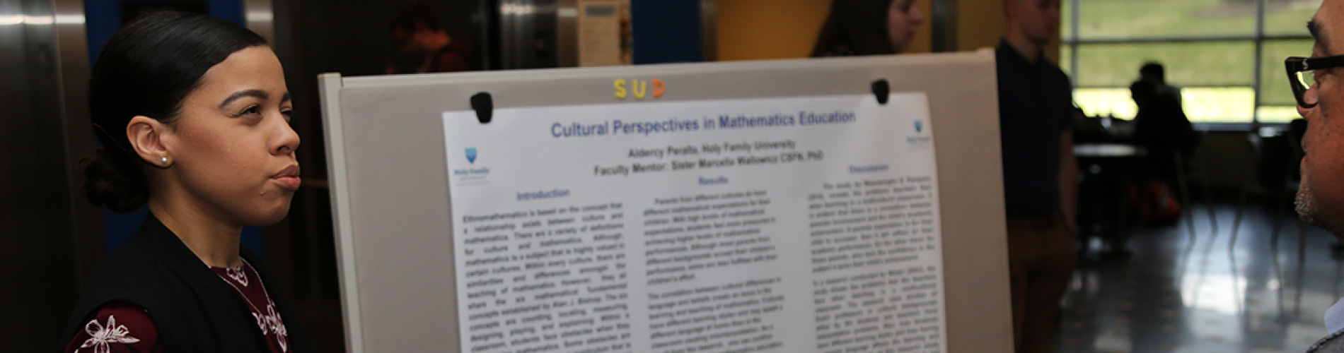 Student presents research at poster session