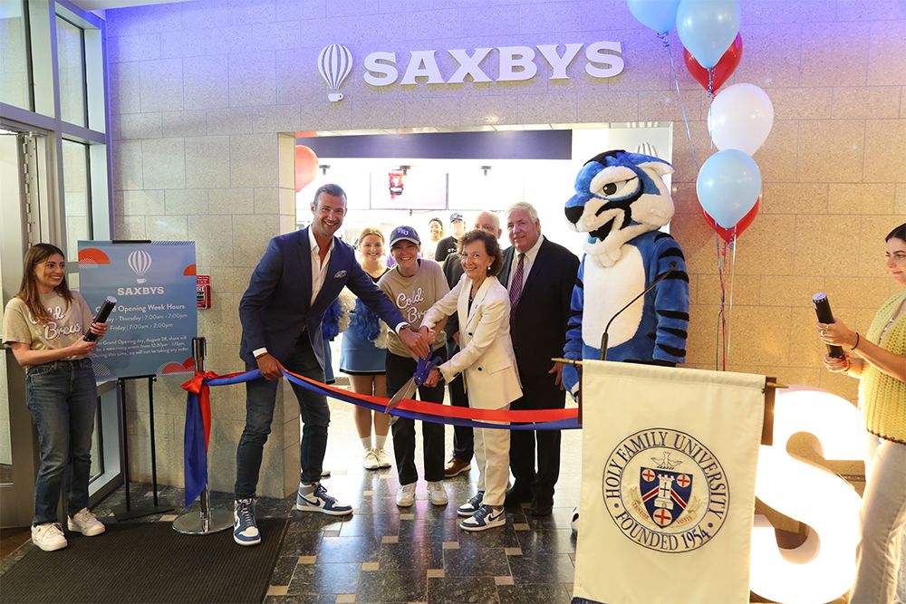 Ribbon cutting at opening of campus Saxbys