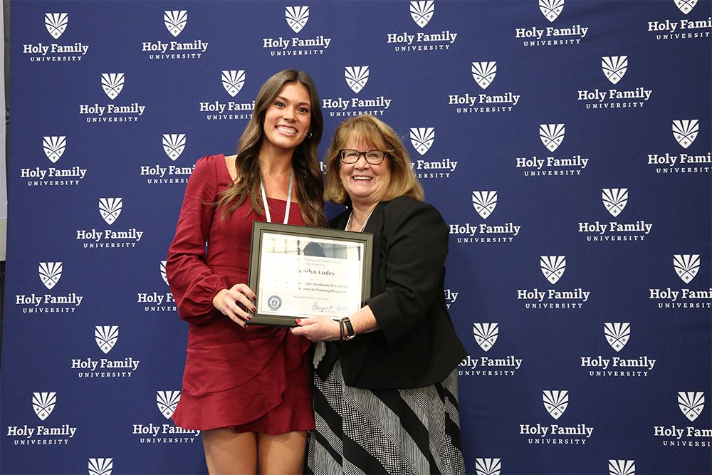 Nursing student receiving award for excellence