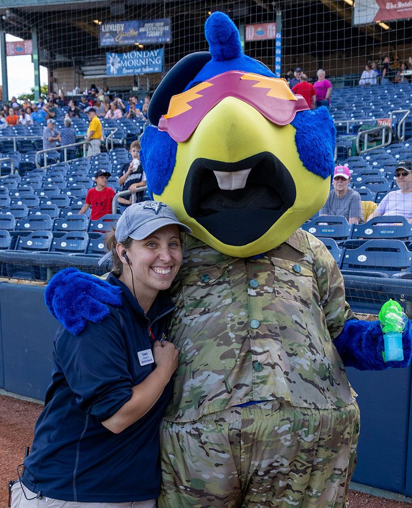 Casey Borish at Double-A stadium with mascot