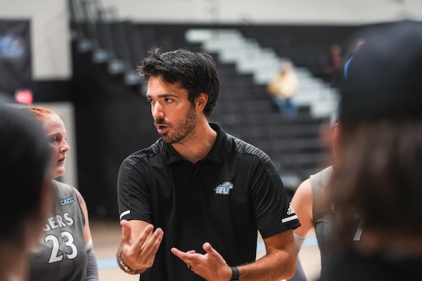 Coach Sibilia providing coaching tips to players