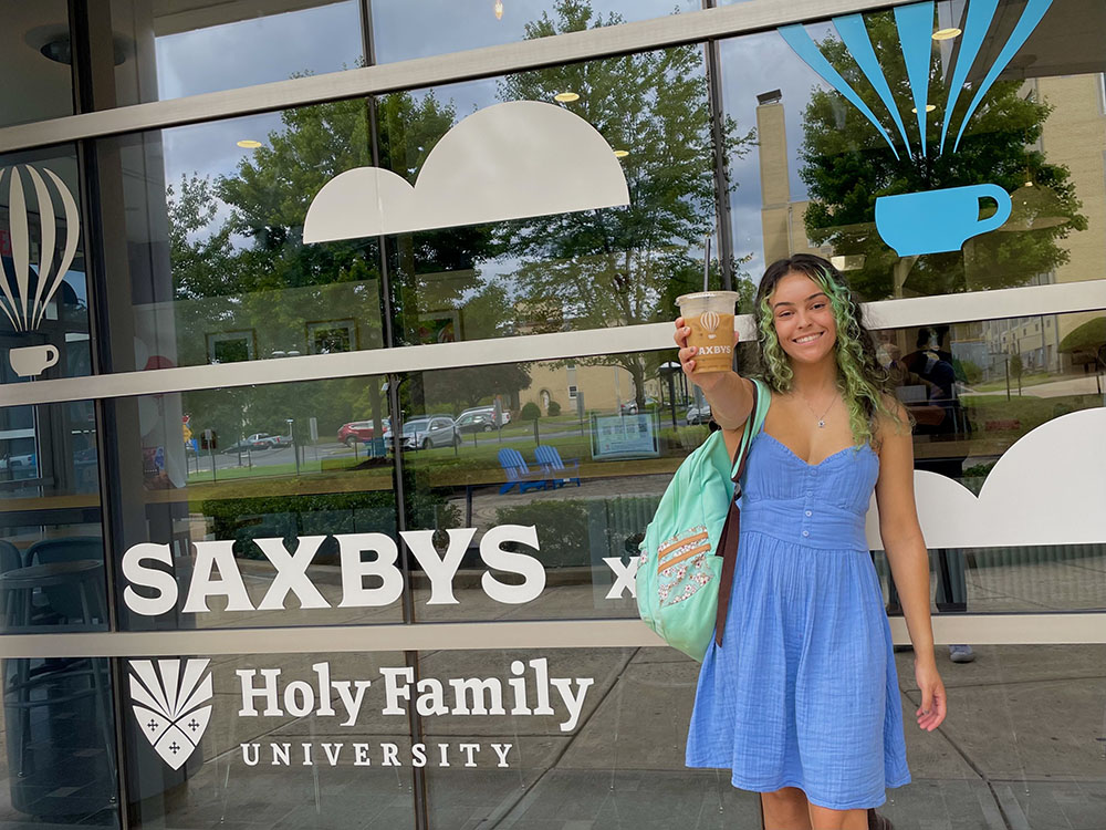 Mia Rivera outside Saxbys cafe
