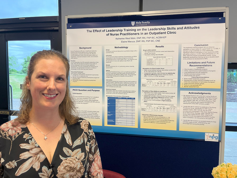 Doctoral student presenting her research poster at the Spring 2024 DNP event.