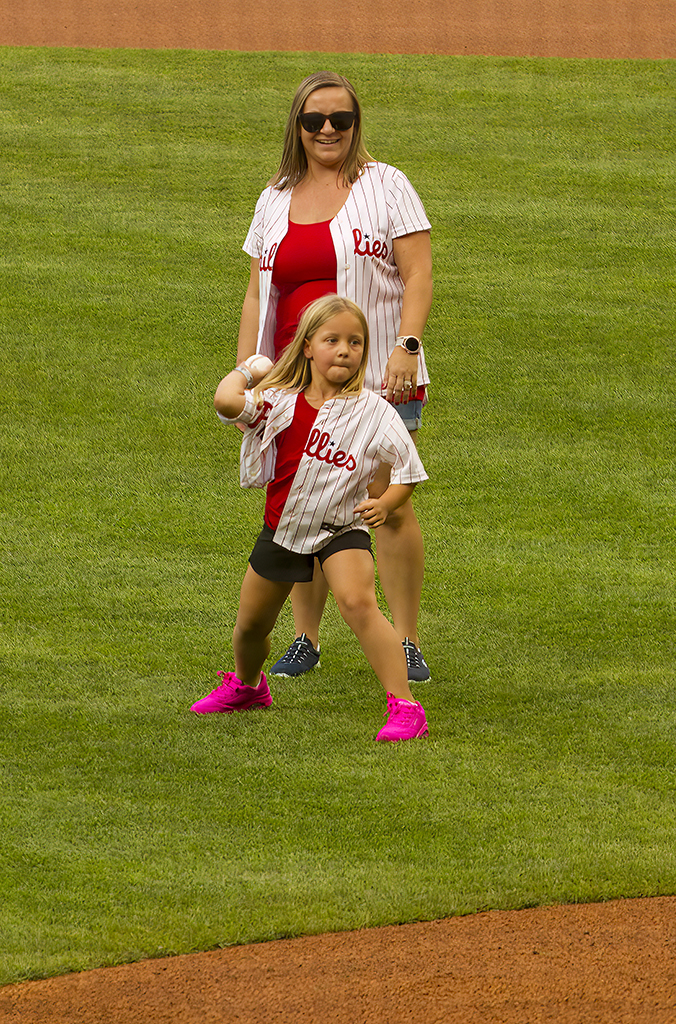 Hallie Fitzgerald, daughter of Bill Fitzgerald ’06 and Cindy (Ziegler) Fitzgerald ’07, M’12, threw the ceremonial first pitch. The family won this honor at the 2022 Tigers on the Loose online auction.