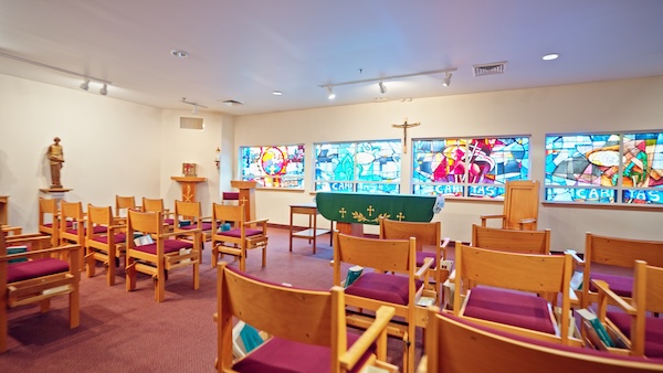 The Delaney Hall chapel and altar with empty chairs before a service