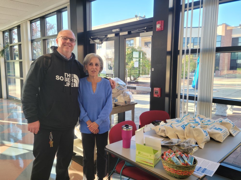 Bucks County Drug & Alcohol Commission staff distributing free Narcan kits and fentanyl testing strips to students.