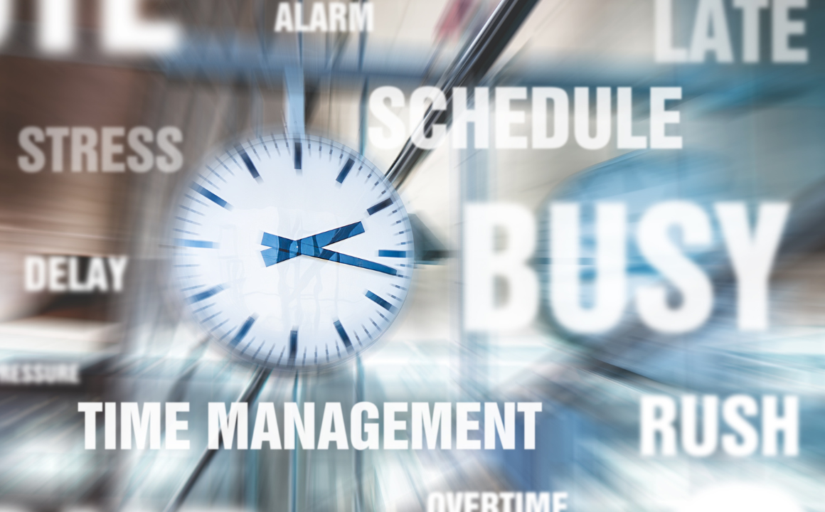 A busy graphic with a clock and words like "stress", "busy" and "rush" across it