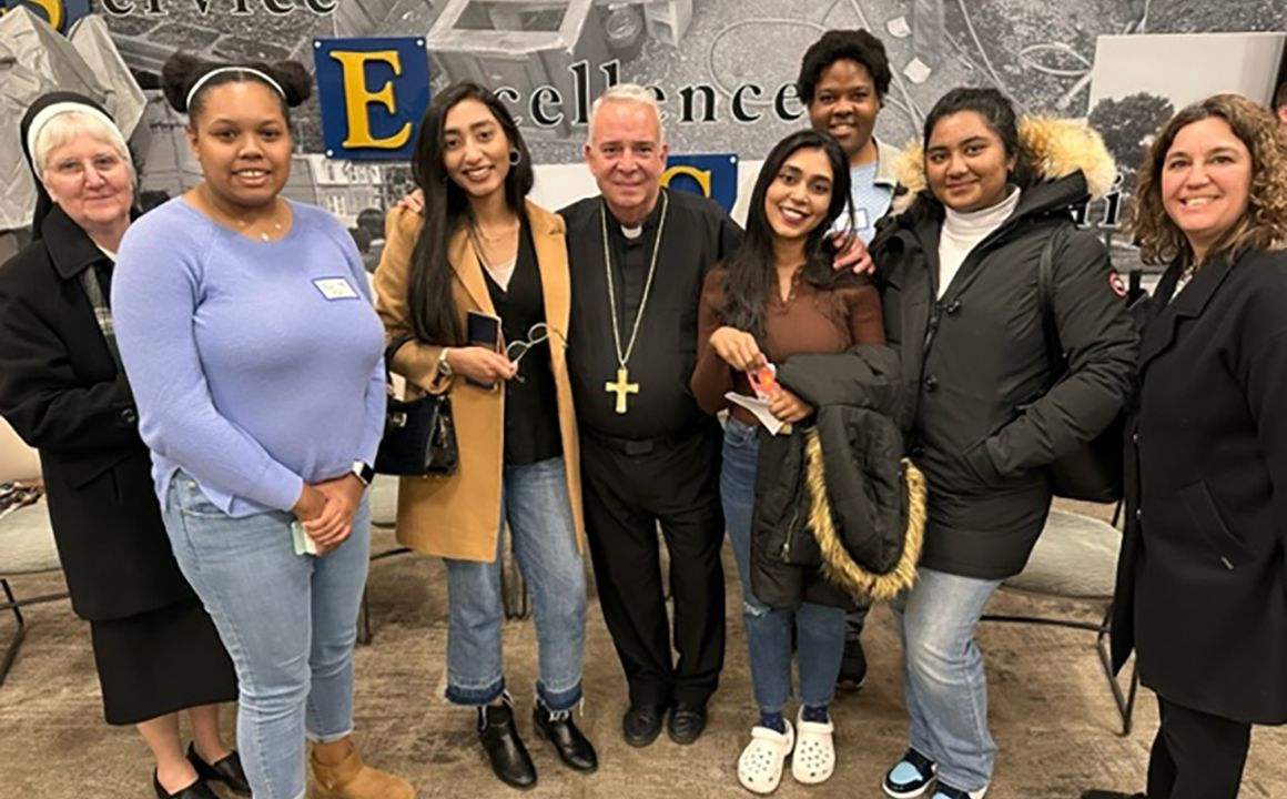 Sister Rita Fanning, CSFN, '89, vice president of Mission Integration (far left), Archbishop Nelson J. Pérez (center), and Jill Snyder, director of Campus Ministry (far right), with Holy Family University students Maya Myers, Kawish Sadaqat, Mehwish Sadaqat, Julian Stewart, and Esha Dean at the Synod on Synodality.
