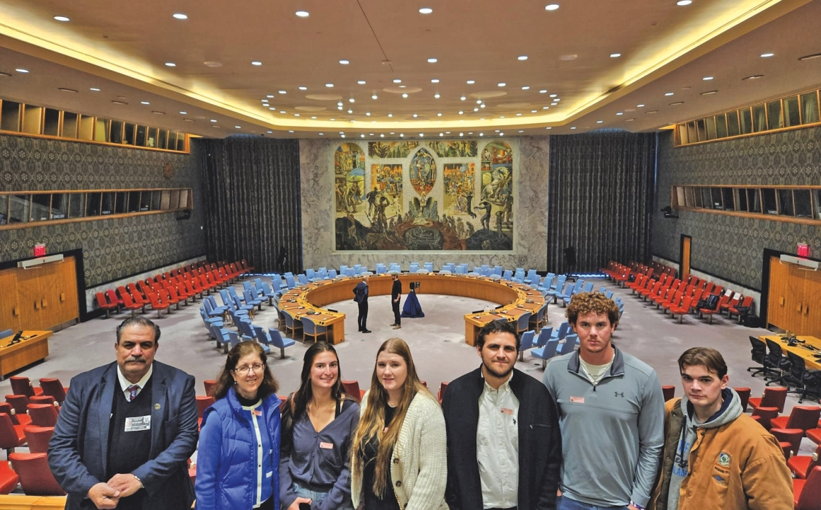 HFU students and advisors standing in the United Nations building