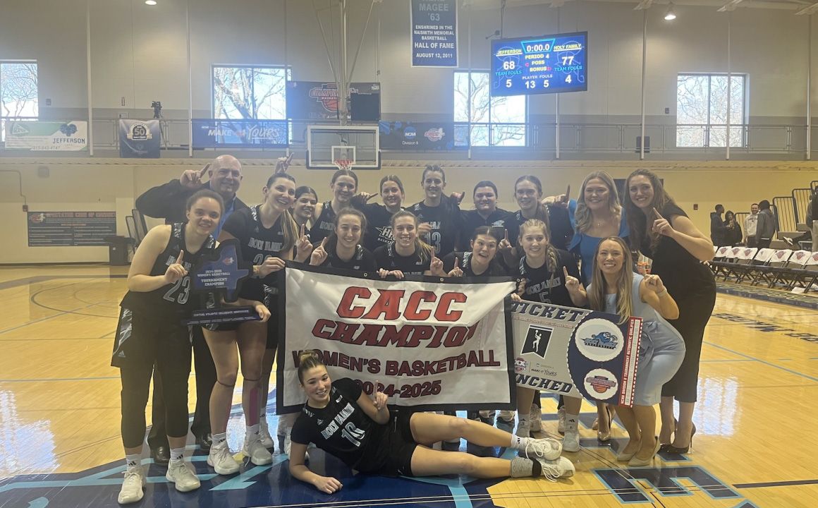 Holy Family University Women's Basketball team celebrating the CACC Championship