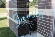 Family written on campus building