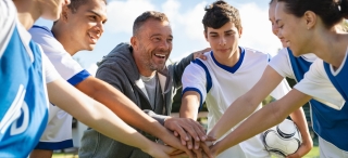 Club_Sports.jpg Students in for a huddle on the field