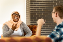 Girl and Guy talking in Residence Hall