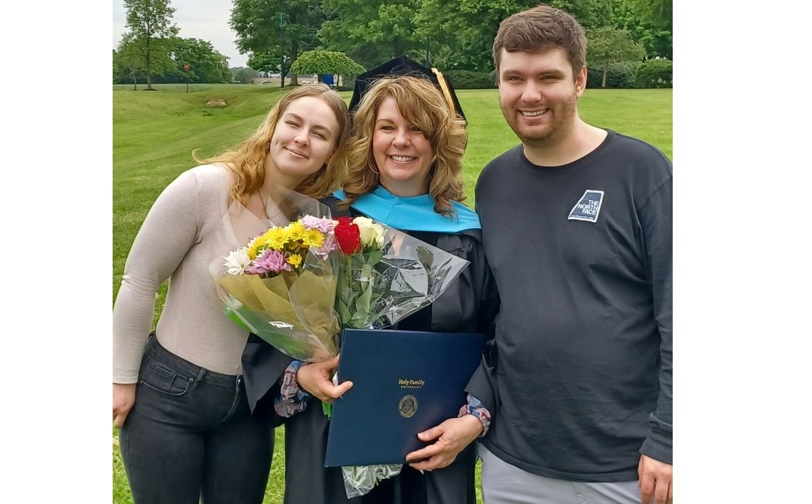 Angela Ashley Graduation Picture w/ Family