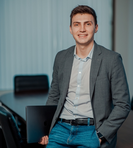 business_-_new_professional_-_male.jpg Business - Male student leaning on desk
