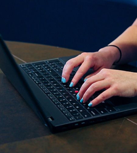 Student working on a laptop
