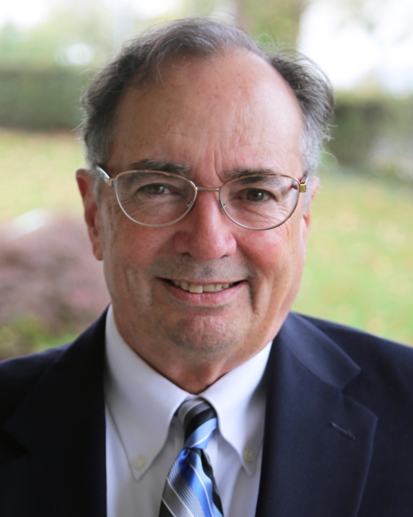 Headshot of Alan Arroyo.